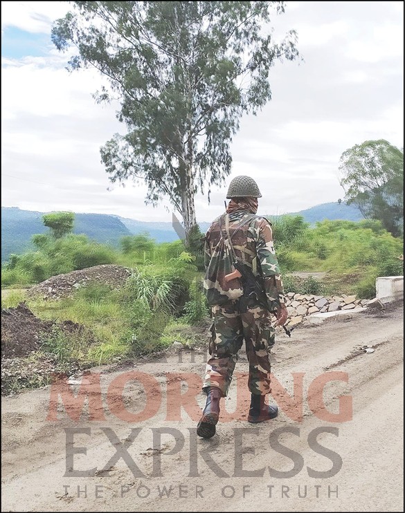 A security force personnel is seen patrolling along the National Highway between Dimapur and Kohima. The Government of India announced the extension of the Disturbed Areas Act in the entire state of Nagaland for six more months from June 30 onwards.  (Morung file Photo)